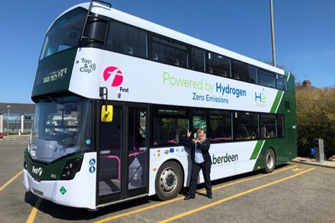 Image of a double-decker bus. "Powered by Hydrogen - zero emmissions" is written on the side.